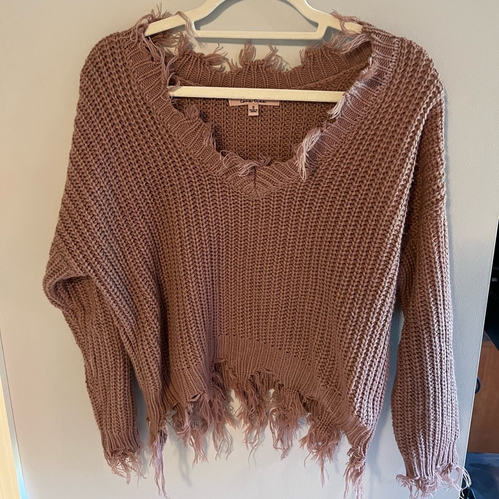Distressed sweater